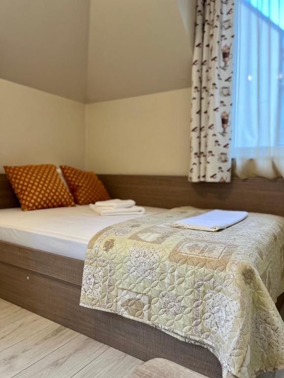 Postel nebo postele na pokoji v ubytování Хостел Атлас - Hostel Atlas