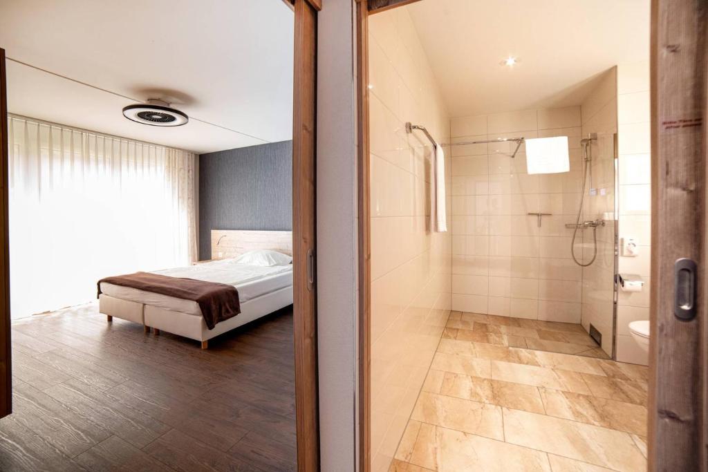 Postel nebo postele na pokoji v ubytování Wohntel - wohnen wie im Hotel