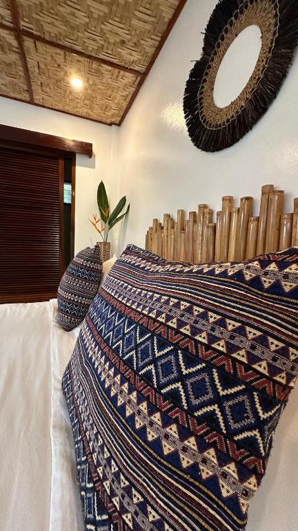 Postel nebo postele na pokoji v ubytování Yumi Villas
