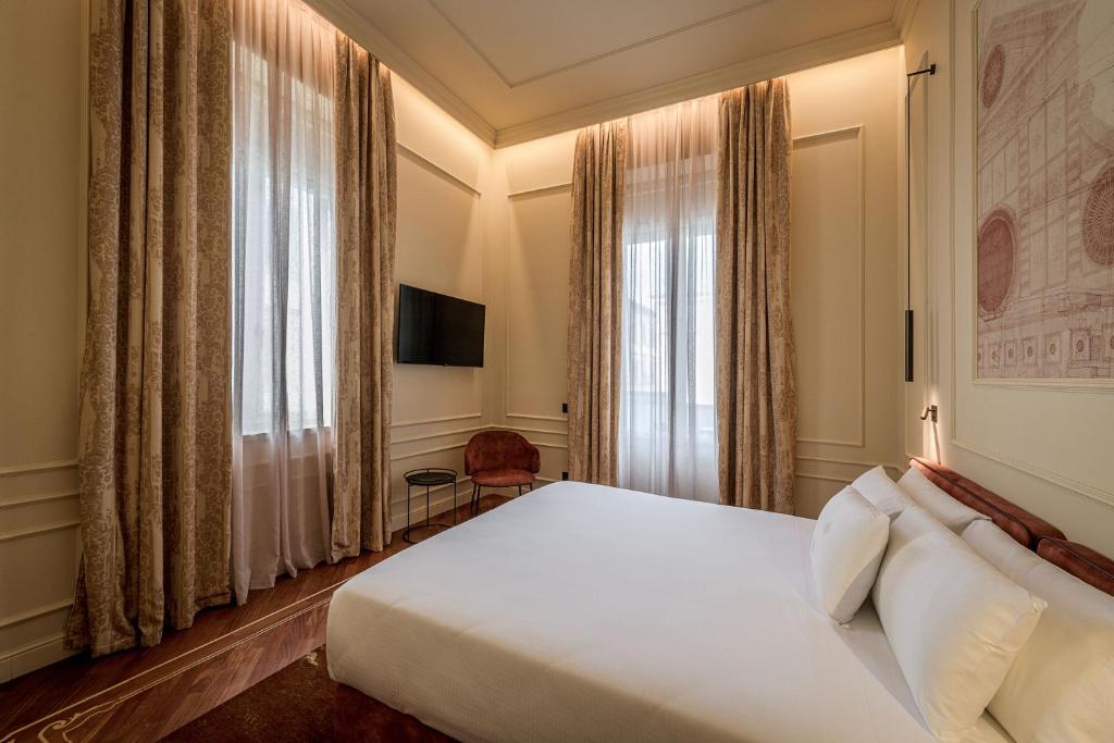 TV a/nebo společenská místnost v ubytování Palazzo Montebello