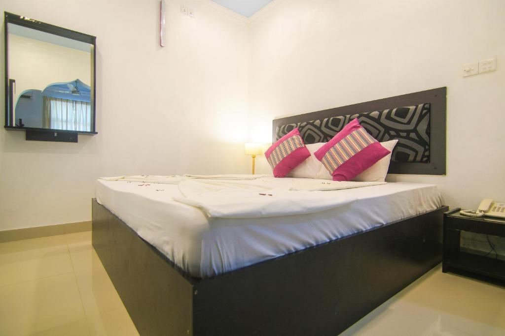 Postel nebo postele na pokoji v ubytování Azoush Tourist Guesthouse