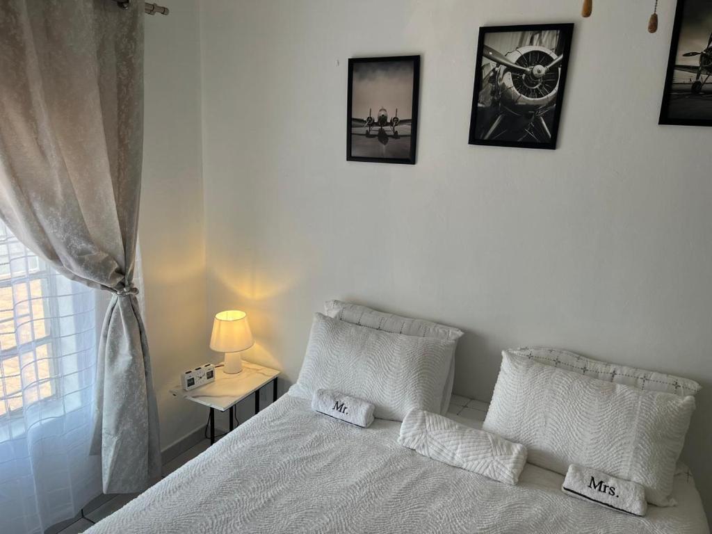 Ένα ή περισσότερα κρεβάτια σε δωμάτιο στο Eagle Apartment