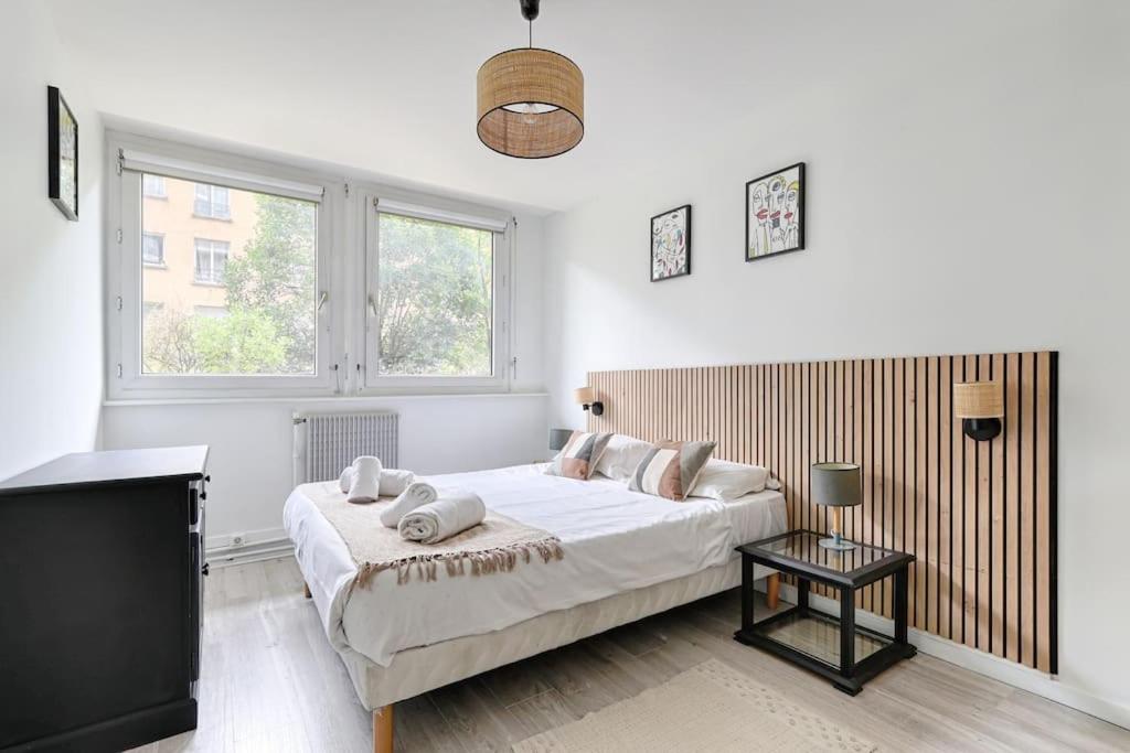 Postel nebo postele na pokoji v ubytování Beaugrenelle Tour Eiffel II Cosy Apartment 2BR