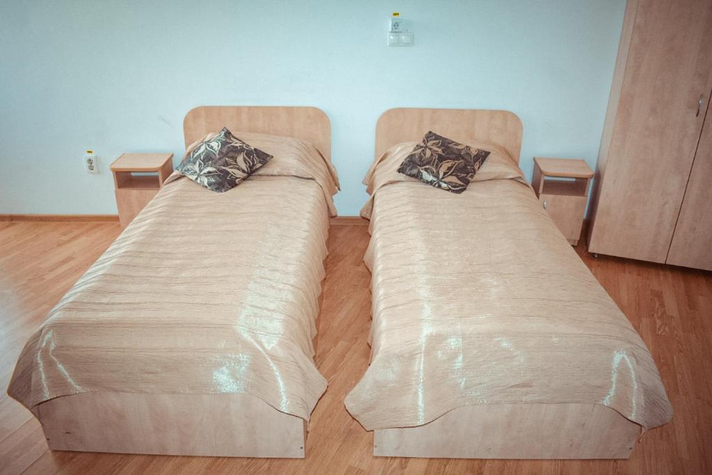 Postel nebo postele na pokoji v ubytování Pensiunea Belvedere