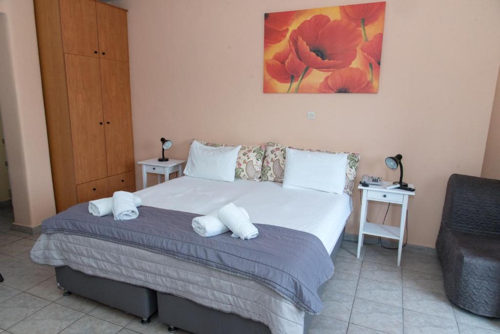 Postel nebo postele na pokoji v ubytování Panorama Hotel
