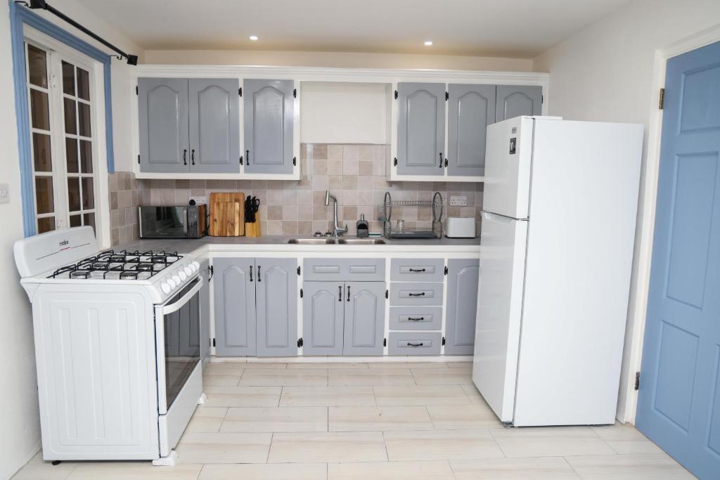 Kuchyň nebo kuchyňský kout v ubytování Sugarmon Villas