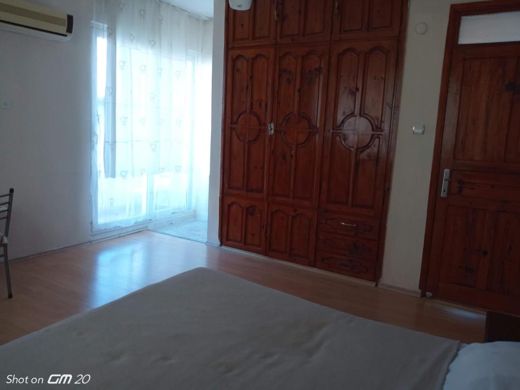 Postel nebo postele na pokoji v ubytování HZD Apartments Hostel