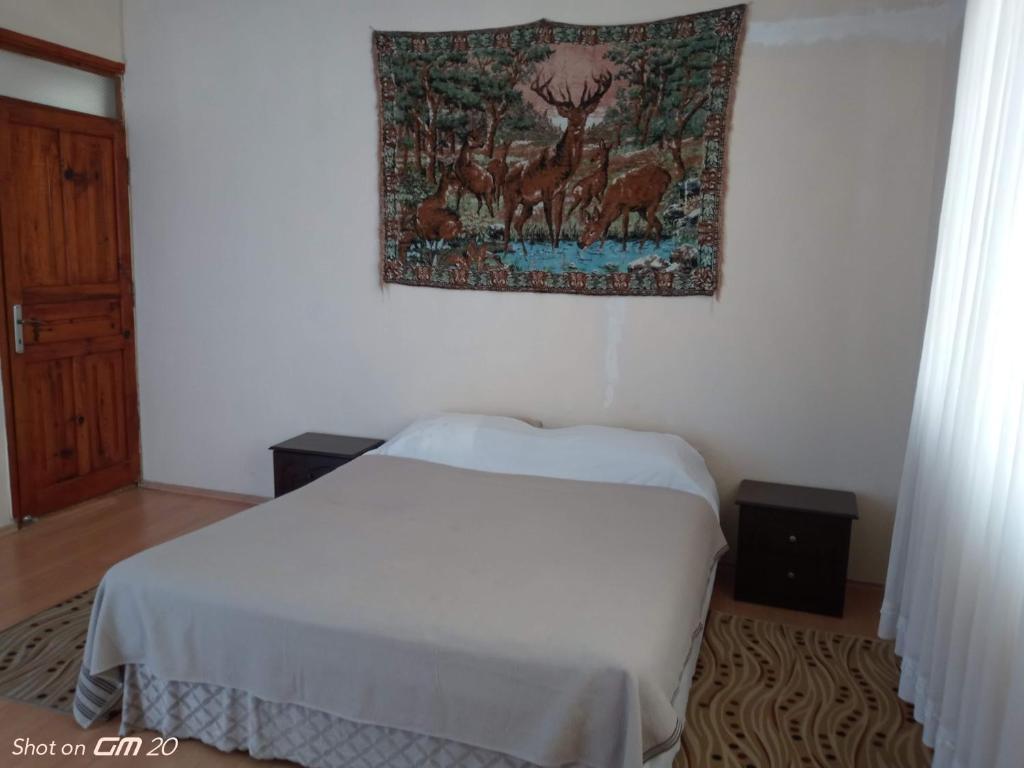 Postel nebo postele na pokoji v ubytování HZD Apartments Hostel
