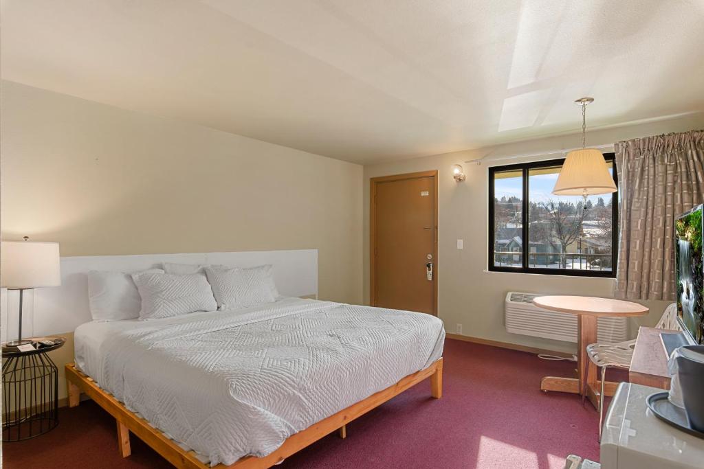Postel nebo postele na pokoji v ubytování Cashmere Inn