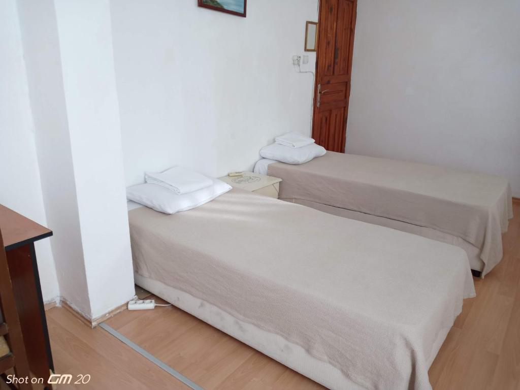 Postel nebo postele na pokoji v ubytování HZD Apartments Hostel