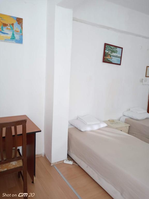 Postel nebo postele na pokoji v ubytování HZD Apartments Hostel