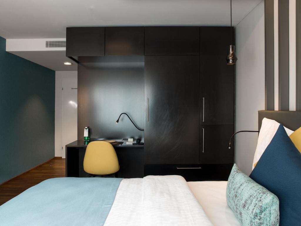 Postel nebo postele na pokoji v ubytování Park Hotel Zug