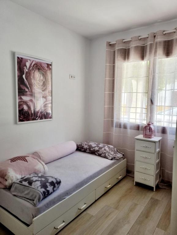 Postel nebo postele na pokoji v ubytování CASA CLEMEN