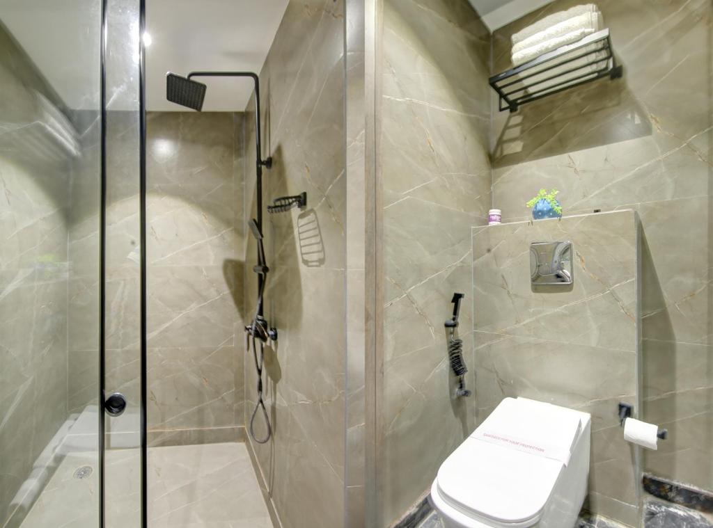 Koupelna v ubytování Hotel Uptown 1Km Connaught Place