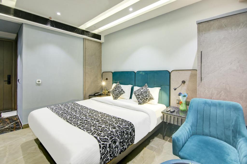 Postel nebo postele na pokoji v ubytování Hotel Uptown 1Km Connaught Place