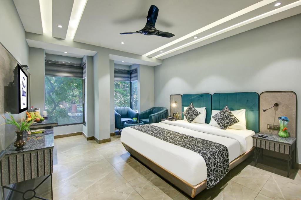 Postel nebo postele na pokoji v ubytování Hotel Uptown 1Km Connaught Place