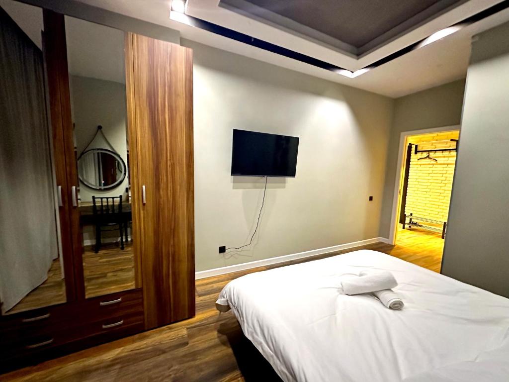 Prego apartments Astana - One-Bedroom Loft Apartment With One Queen Bed