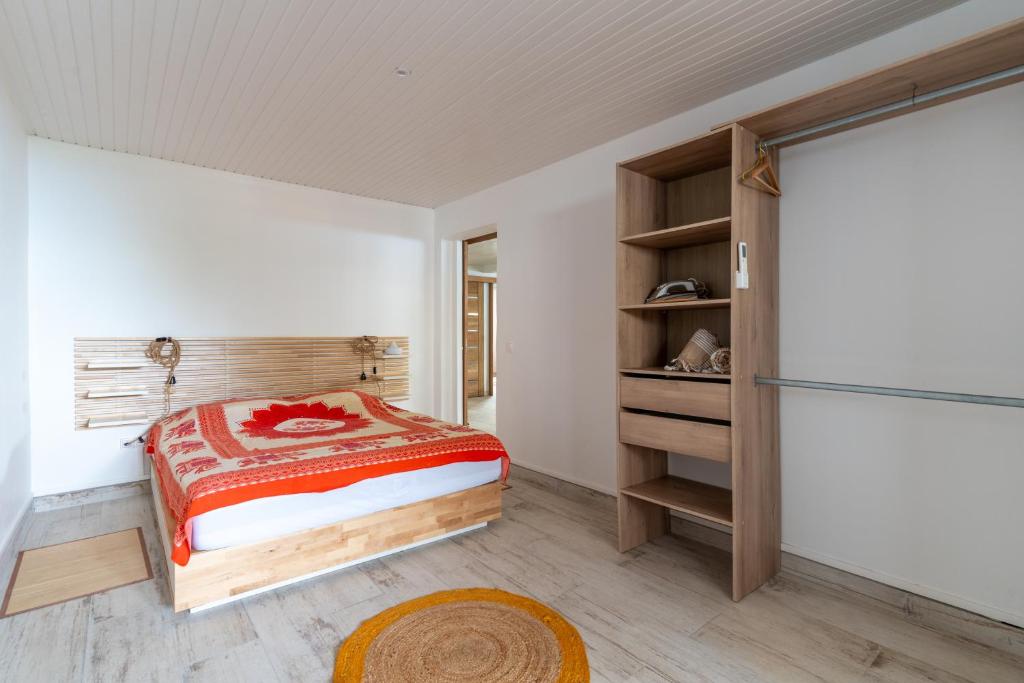 Postel nebo postele na pokoji v ubytování Domaine Madinina