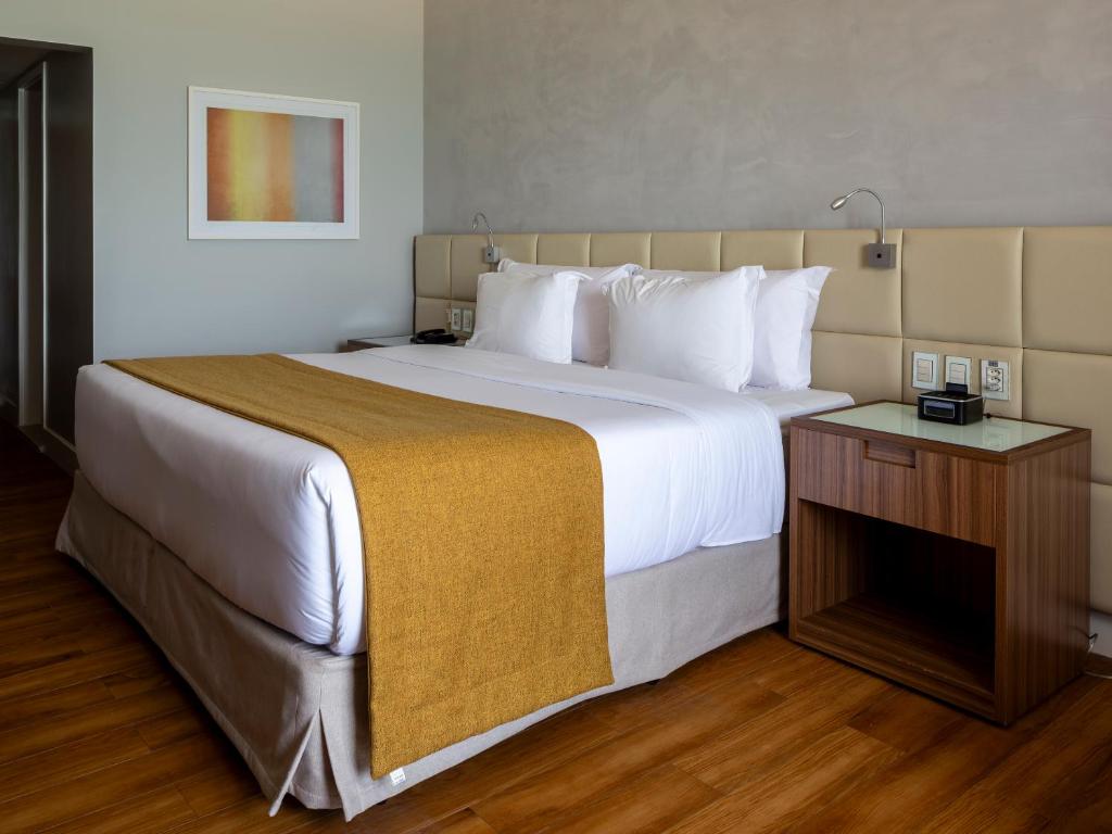 Postel nebo postele na pokoji v ubytování Hotel Gran Marquise