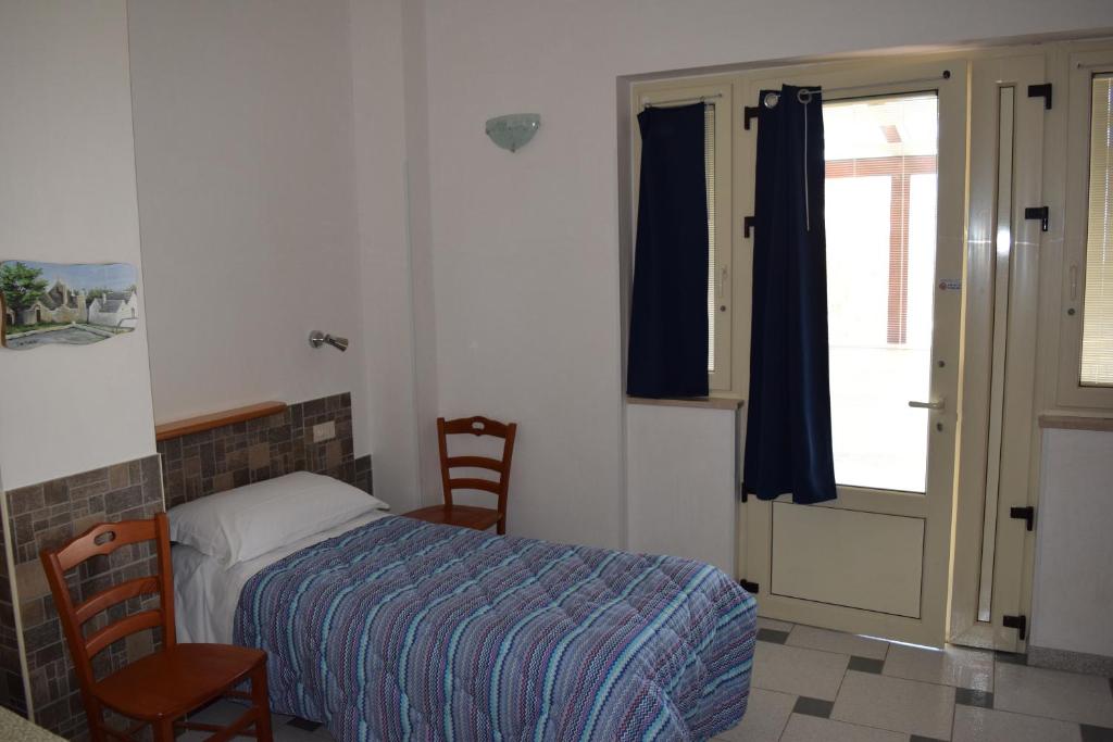 Posteľ alebo postele v izbe v ubytovaní Bed & Breakfast La Collinetta