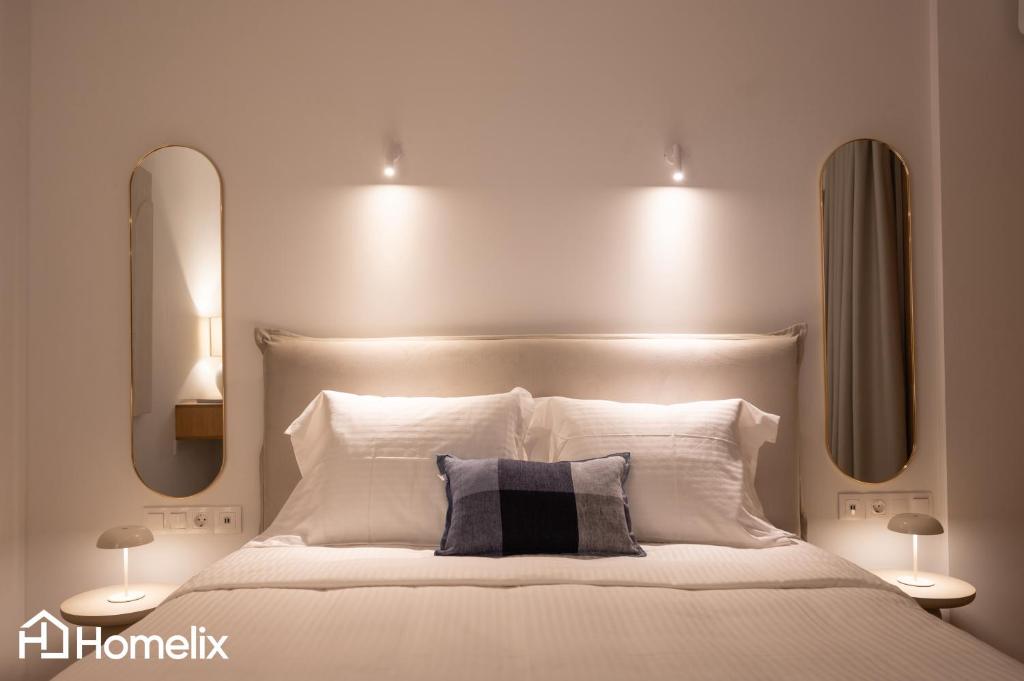 Postel nebo postele na pokoji v ubytování AMAYA - Sea View Suites