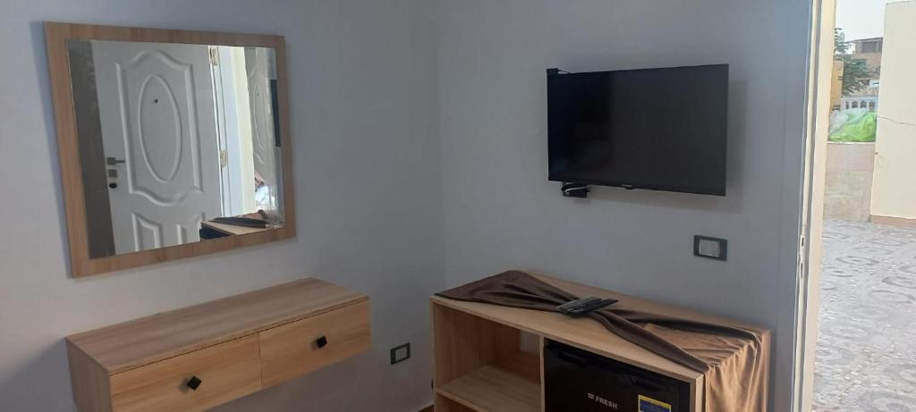 TV a/nebo společenská místnost v ubytování Malak Guest House