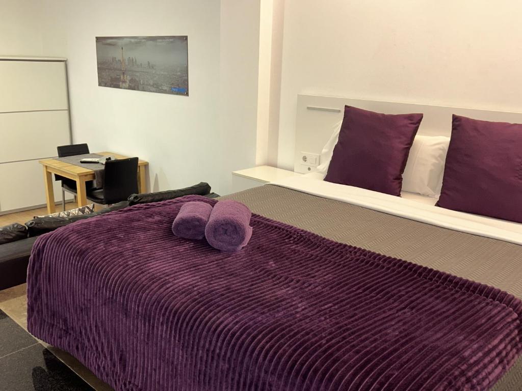Postel nebo postele na pokoji v ubytování Apartahotel Baldiri