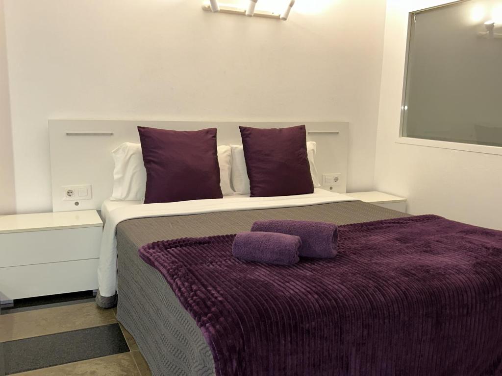 Postel nebo postele na pokoji v ubytování Apartahotel Baldiri