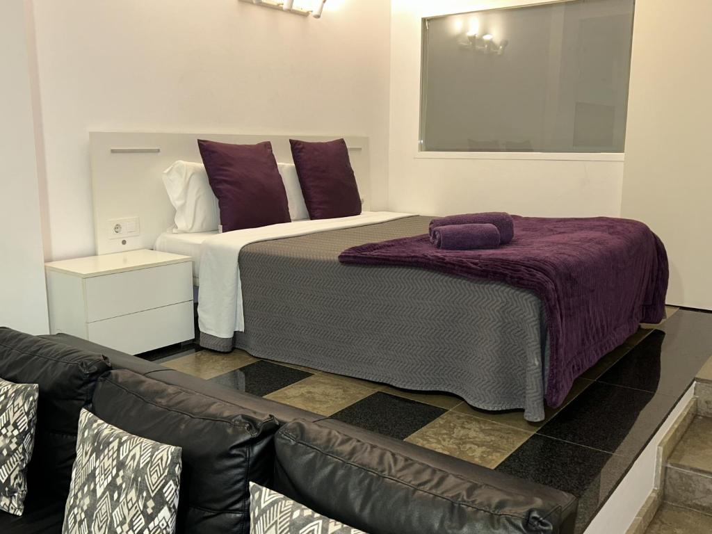 Postel nebo postele na pokoji v ubytování Apartahotel Baldiri