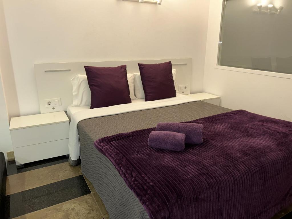 Postel nebo postele na pokoji v ubytování Apartahotel Baldiri