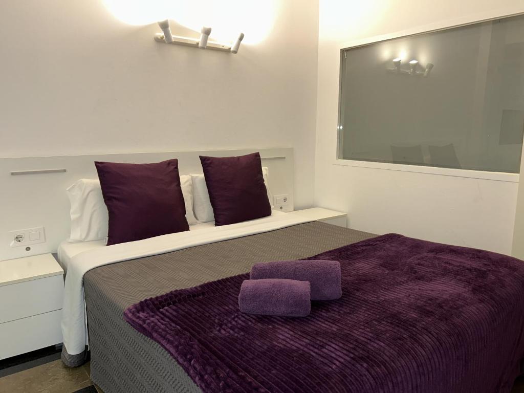 Postel nebo postele na pokoji v ubytování Apartahotel Baldiri