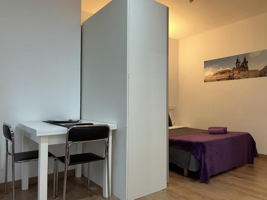 Postel nebo postele na pokoji v ubytování Apartahotel Baldiri