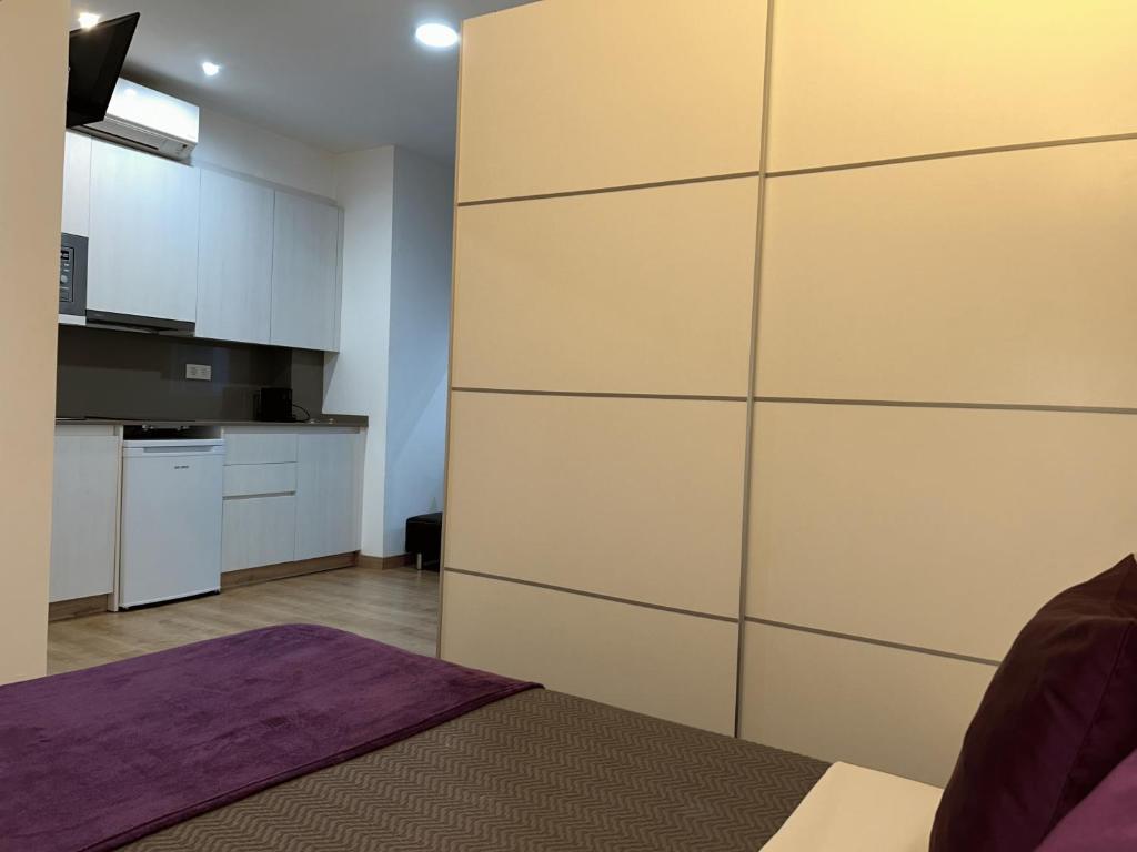 Kuchyň nebo kuchyňský kout v ubytování Apartahotel Baldiri