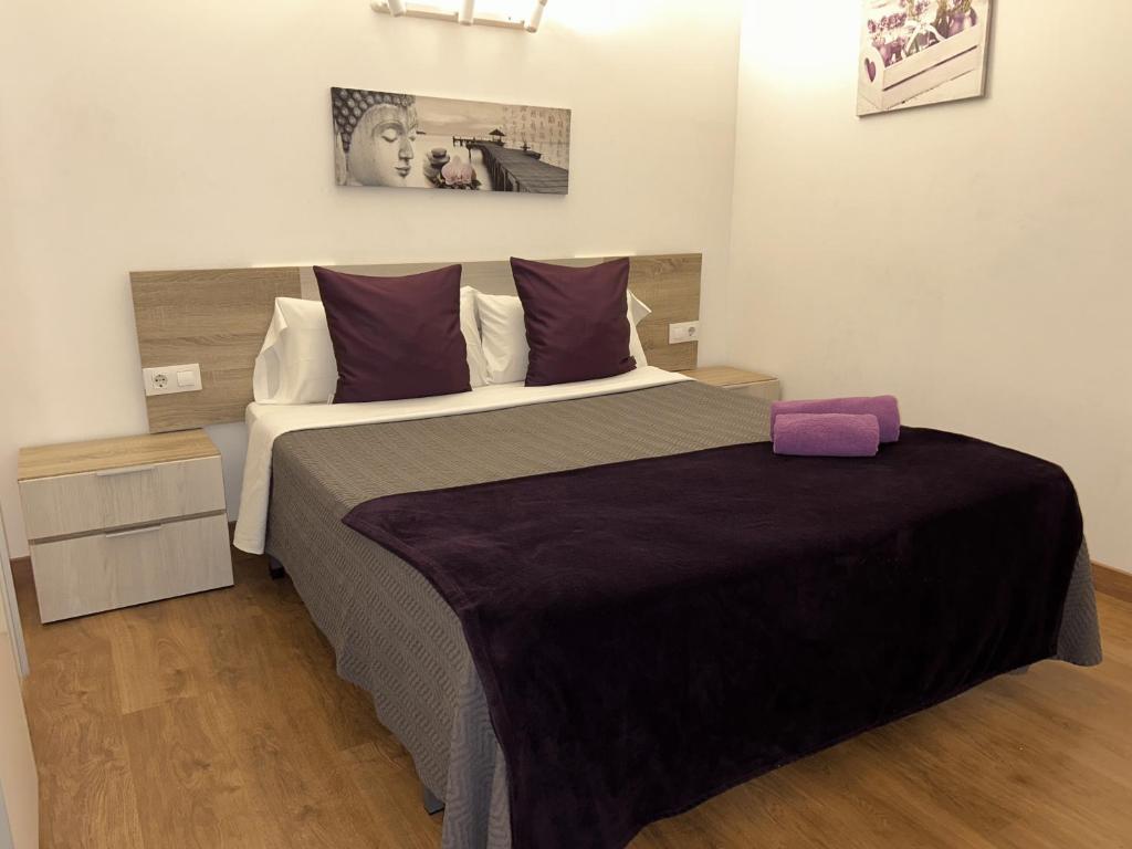 Postel nebo postele na pokoji v ubytování Apartahotel Baldiri