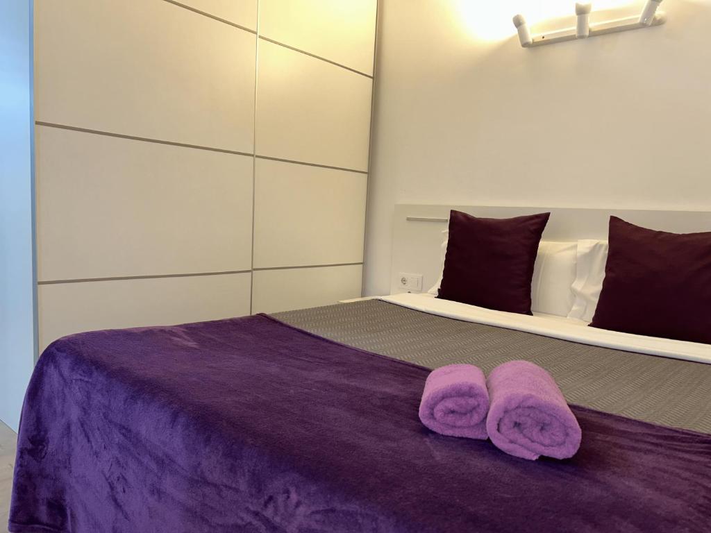 Postel nebo postele na pokoji v ubytování Apartahotel Baldiri