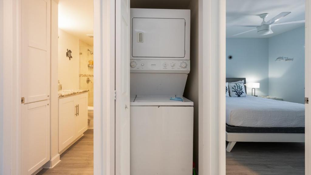 Voodi või voodid majutusasutuse Blue Haven Key LargoOcean Pointe 1315 toas