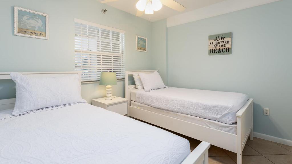 Voodi või voodid majutusasutuse Reel Key Largo Escape Ocean Pointe 5209 toas