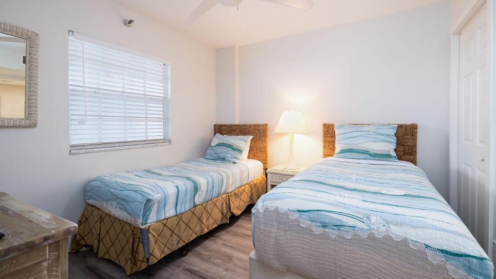 Voodi või voodid majutusasutuse Nauti Hideaway Ocean Pointe 2314 toas