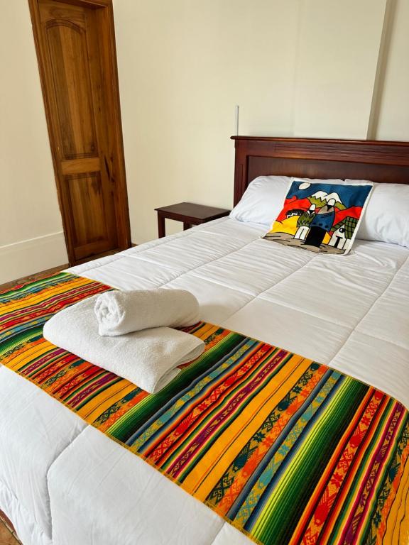 Postel nebo postele na pokoji v ubytování Quito Basecamp - Adventure Hostel