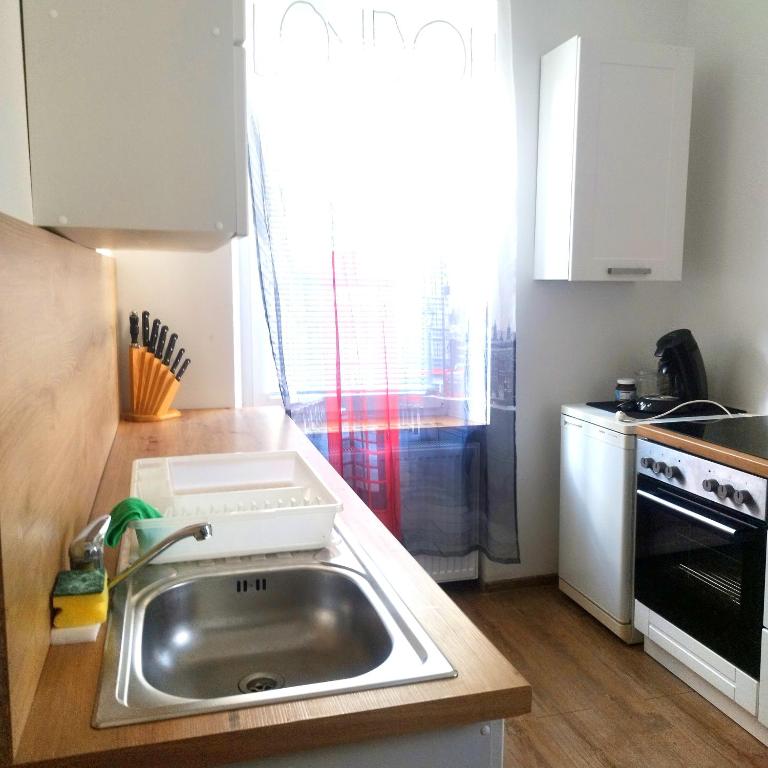Kuchyň nebo kuchyňský kout v ubytování Ferienwohnung Stainach