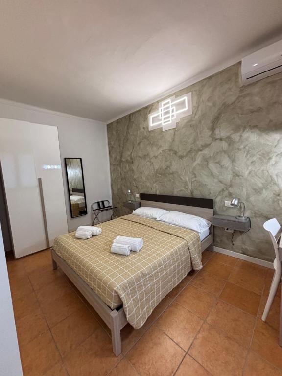 Postel nebo postele na pokoji v ubytování Casa Corte 25