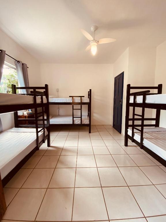 Postel nebo postele na pokoji v ubytování Adios Amigos Hostel