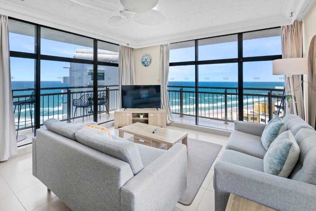 a living room with a view of the ocean at Oceanfront 24th Floor 1 Bedroom Retreat with Stunning Views & Free Parking in Gold Coast