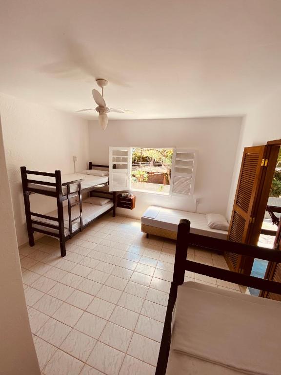 Postel nebo postele na pokoji v ubytování Adios Amigos Hostel