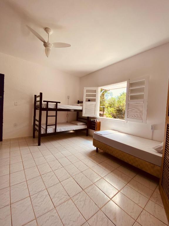 Postel nebo postele na pokoji v ubytování Adios Amigos Hostel