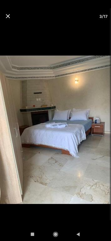 Postel nebo postele na pokoji v ubytování Marrakesh