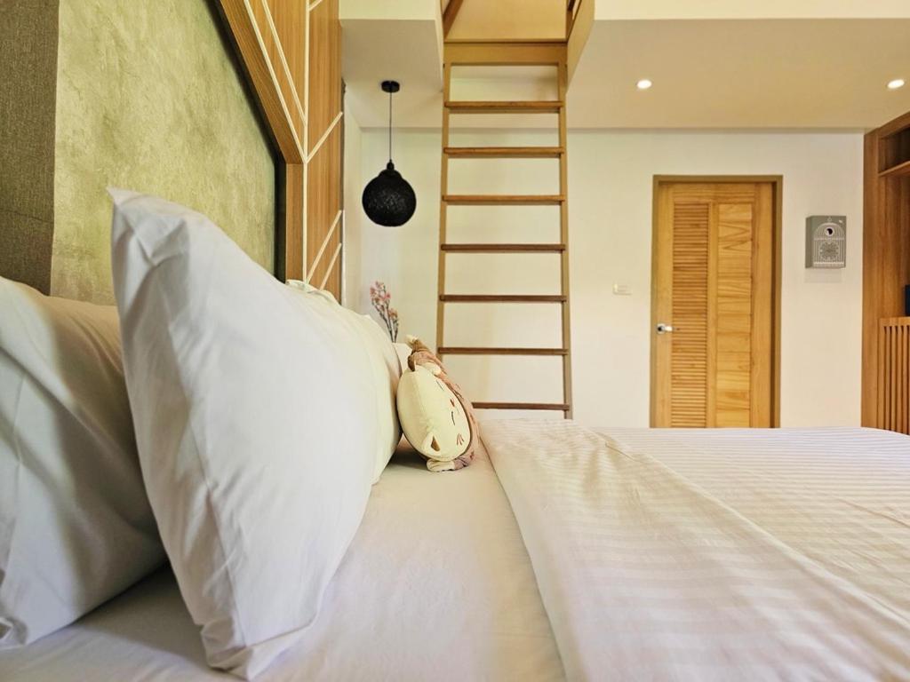 Postel nebo postele na pokoji v ubytování Siri Lagoona Resort