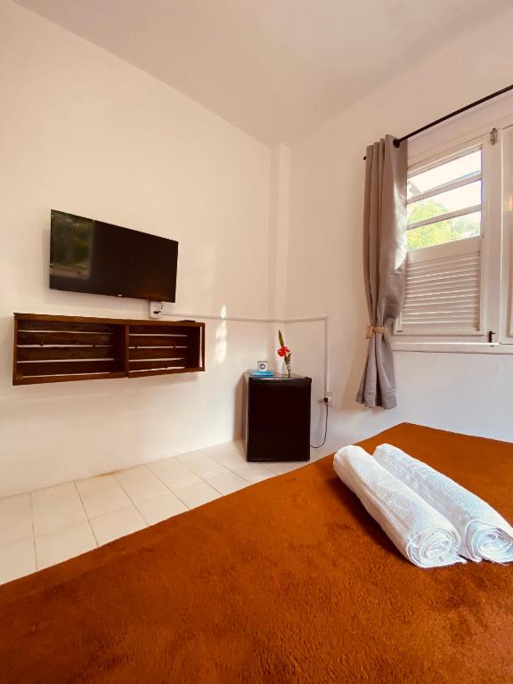 Postel nebo postele na pokoji v ubytování Adios Amigos Hostel