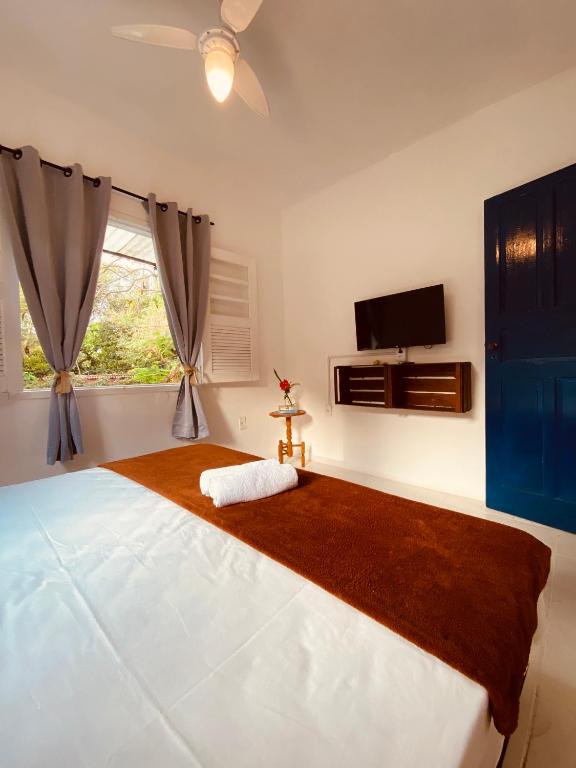 Postel nebo postele na pokoji v ubytování Adios Amigos Hostel