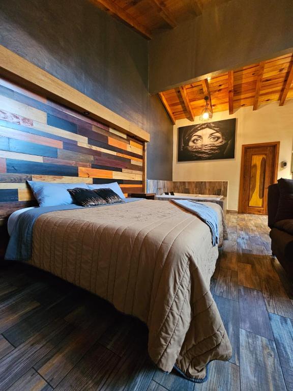 Postel nebo postele na pokoji v ubytování Cabañas Santorito